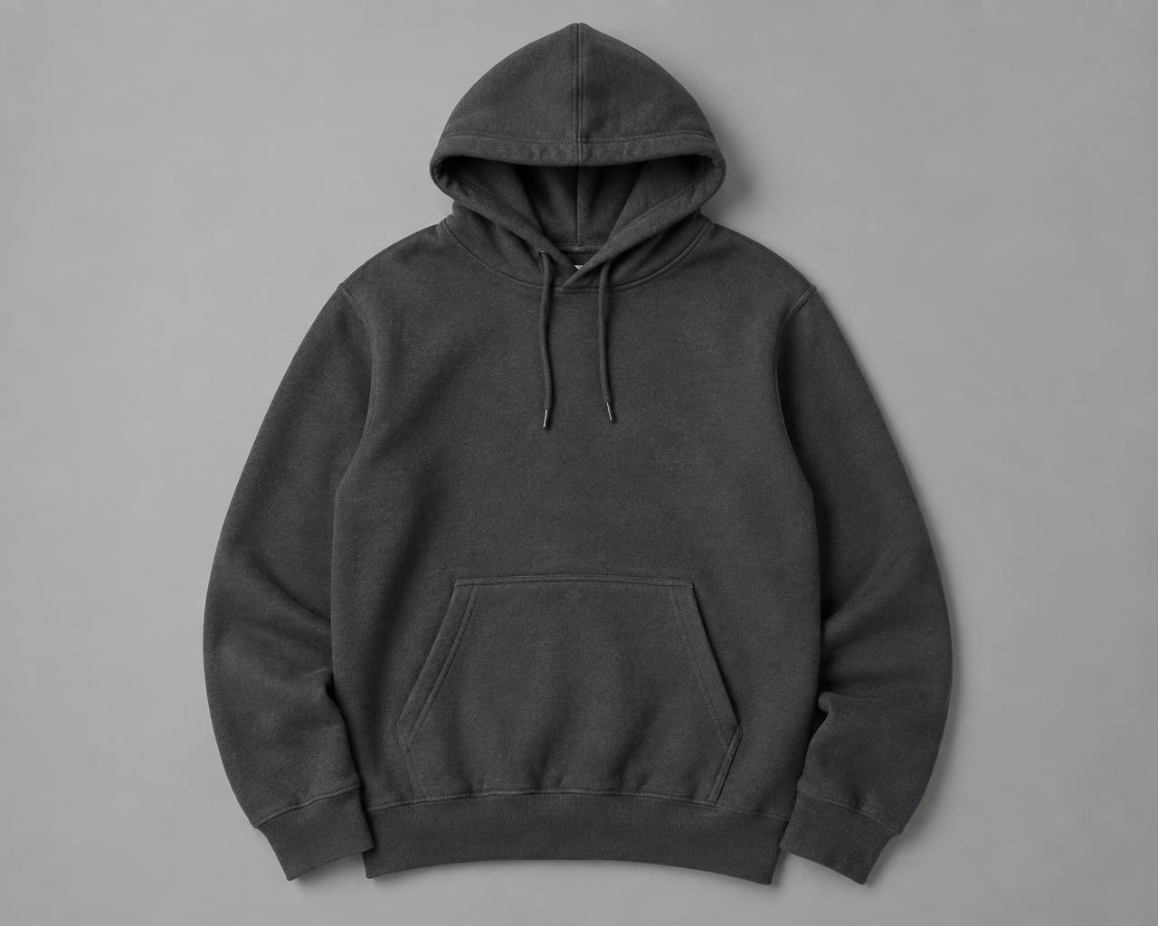 A charcoal hoodie photographed flat on a clean studio background